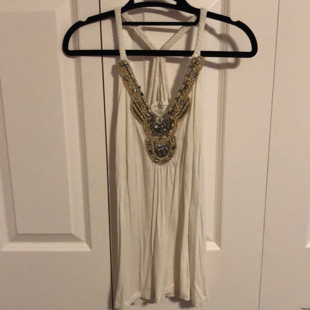 Cream tank with bead design accent